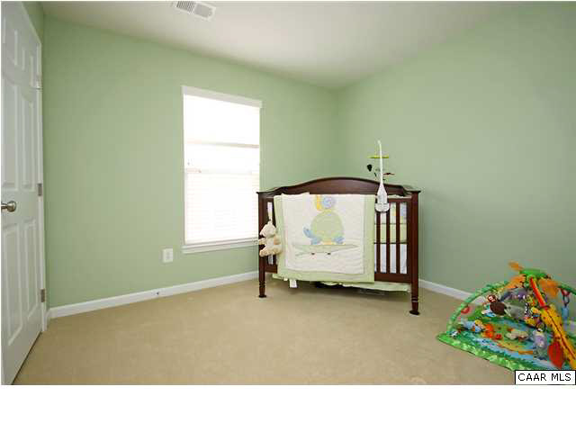 708 Rainier Road Charlottesville, VA 22903 - Photo 18 of 29 a room with a bed and a window