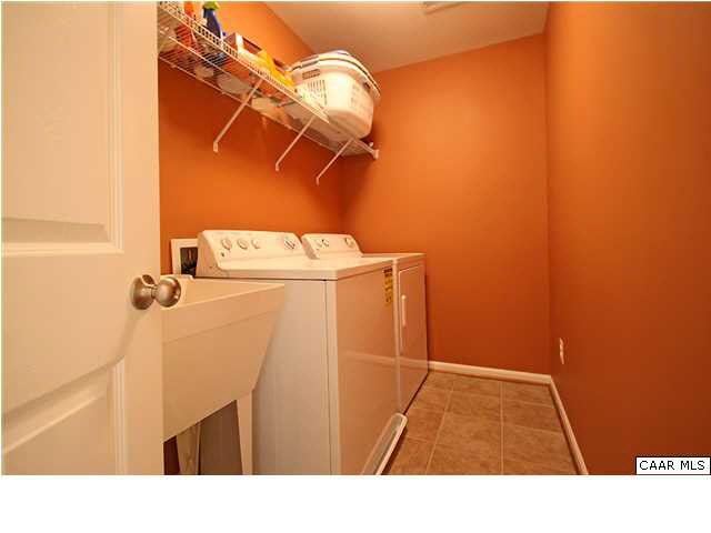 708 Rainier Road Charlottesville, VA 22903 - Photo 22 of 29 a bathroom with a sink and a mirror