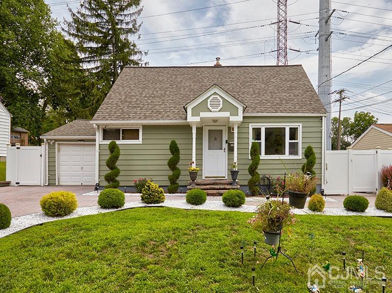 10 Pennington Road New Brunswick, NJ 08901 - Photo 1 of 29 a front view of a house with a yard