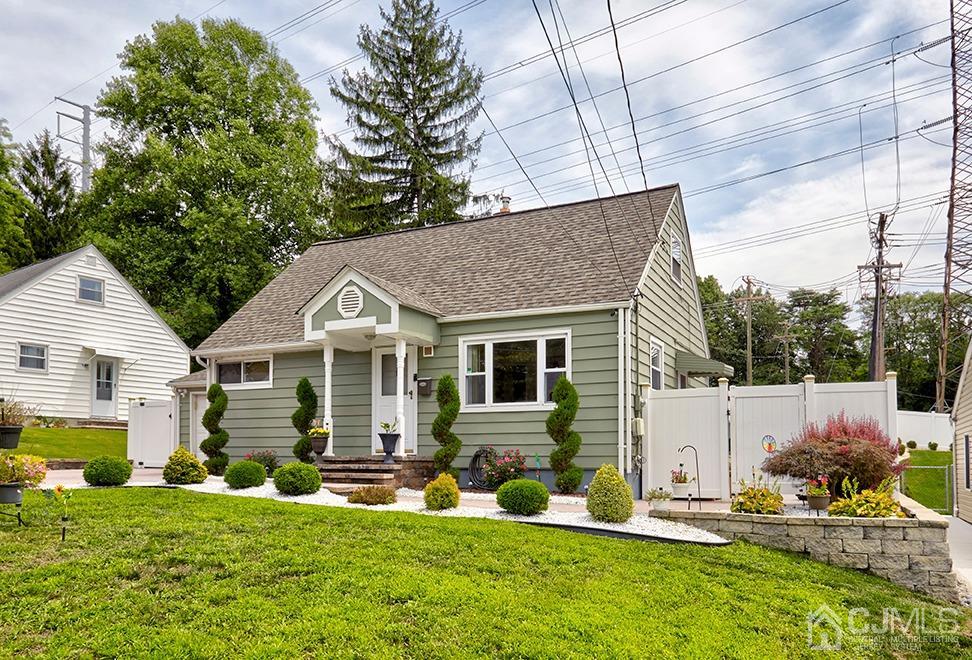 10 Pennington Road New Brunswick, NJ 08901 - Photo 2 of 29 a view of a house with a yard patio and fire pit