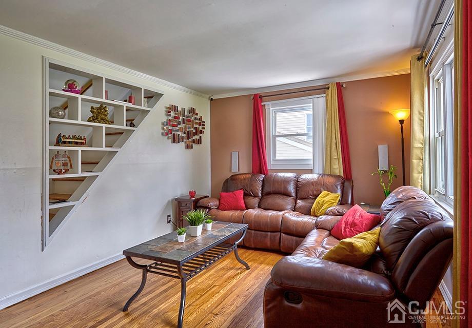 10 Pennington Road New Brunswick, NJ 08901 - Photo 6 of 29 a living room with furniture and a window