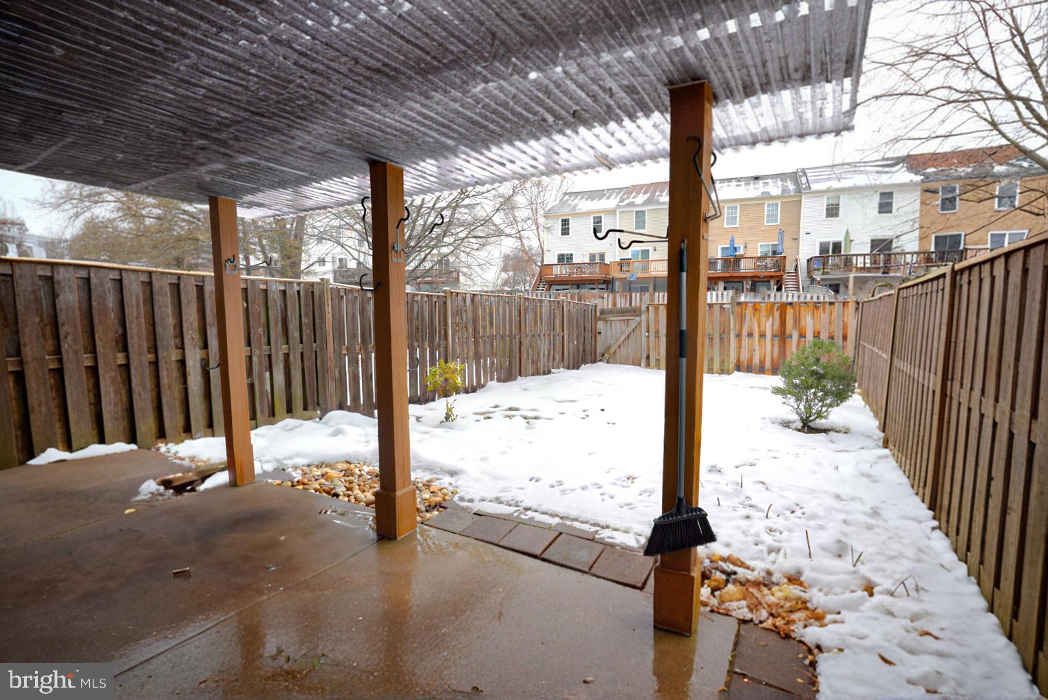3104 Benton Square Drive Olney, MD 20832 - Photo 2 of 11 a view of a street with wooden fence