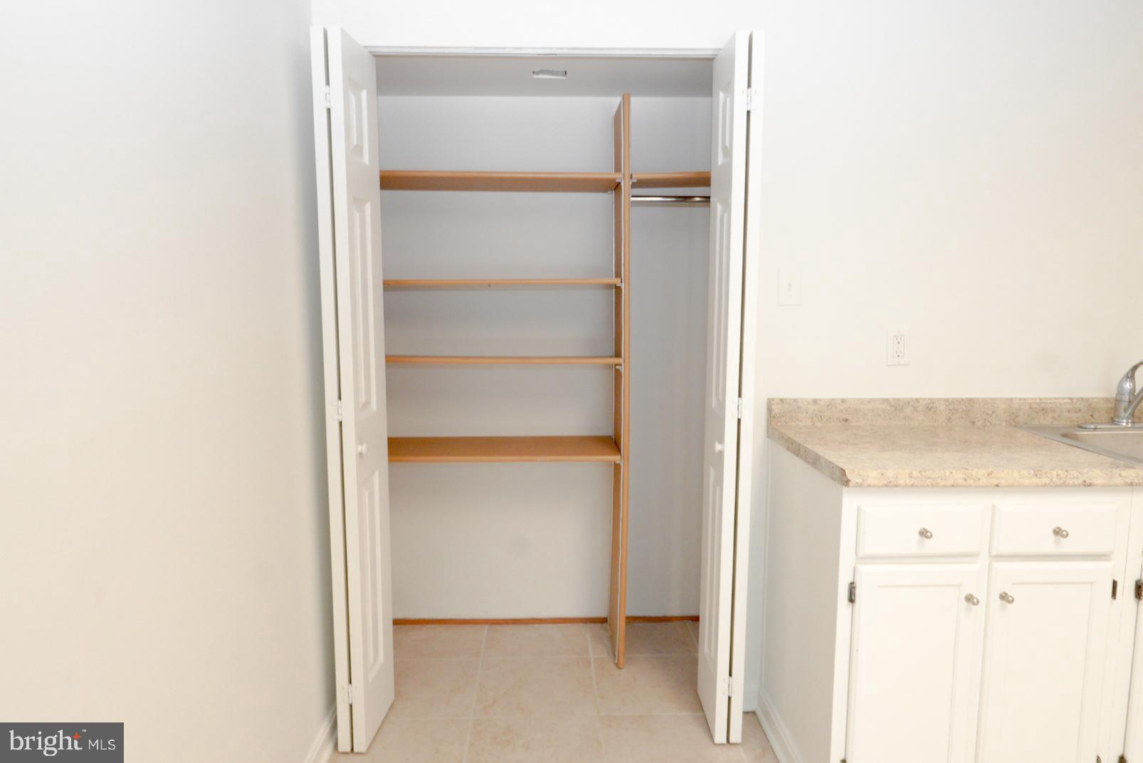 3104 Benton Square Drive Olney, MD 20832 - Photo 6 of 11 a view of walk in closet with empty racks