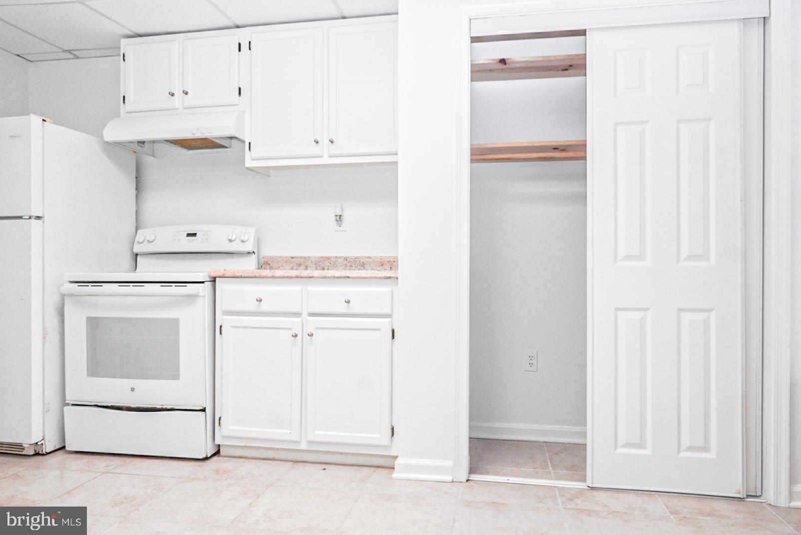 3104 Benton Square Drive Olney, MD 20832 - Photo 8 of 11 a kitchen with cabinets and appliances