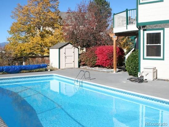 a view of a house with a large tree