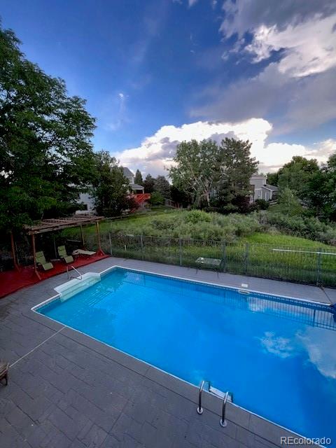 6722 Eagle Place Highlands Ranch, CO 80130 - Photo 16 of 34 a view of outdoor space and swimming pool