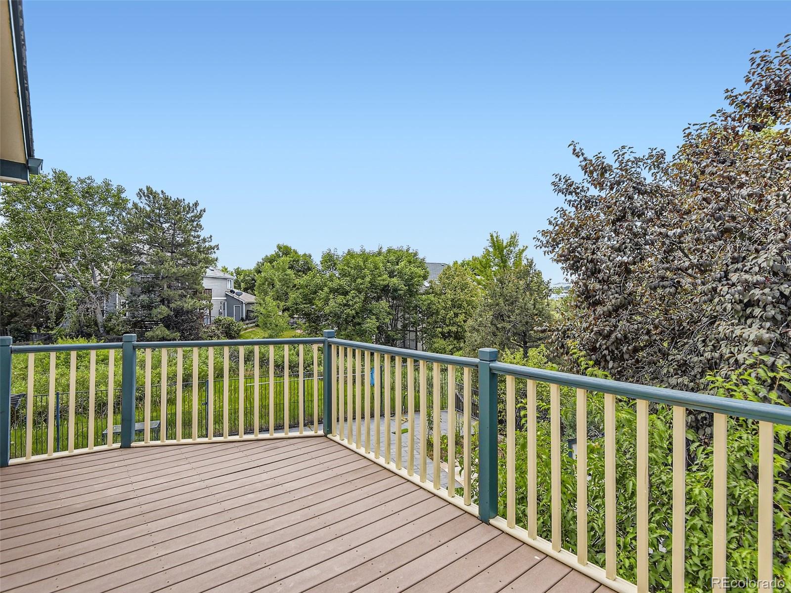 6722 Eagle Place Highlands Ranch, CO 80130 - Photo 18 of 34 a view of a wooden deck