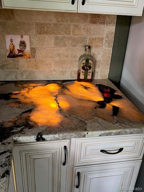 6722 Eagle Place Highlands Ranch, CO 80130 - Photo 24 of 34 a bathroom with a sink and a mirror
