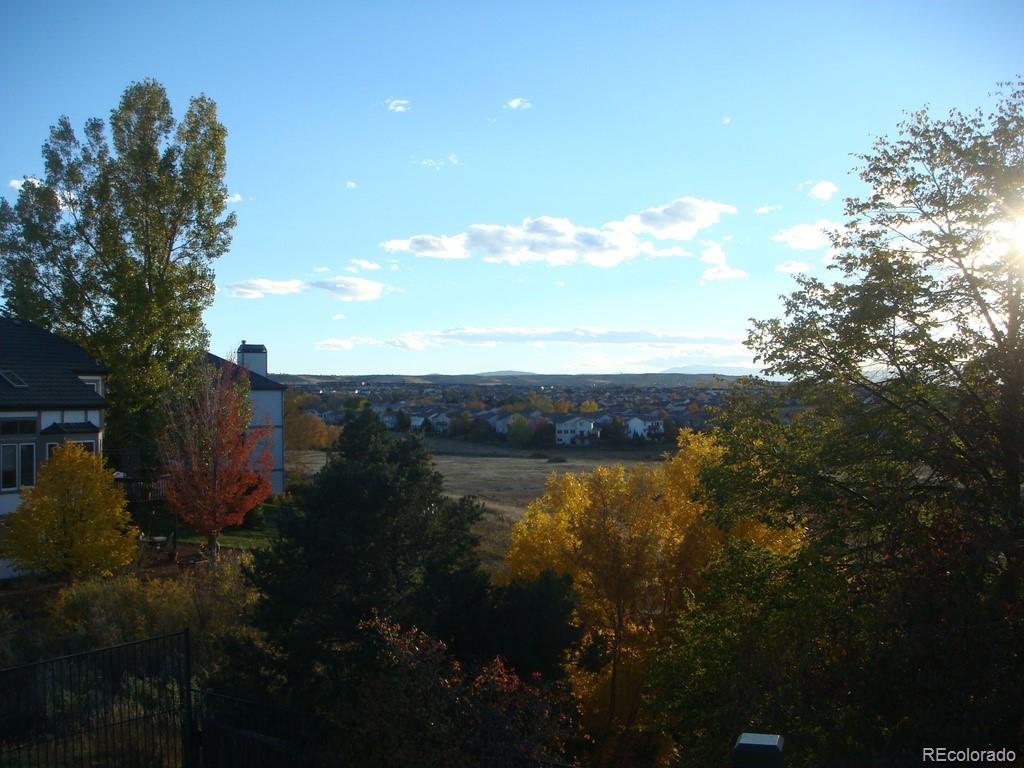 6722 Eagle Place Highlands Ranch, CO 80130 - Photo 32 of 34 a view of lake and mountain
