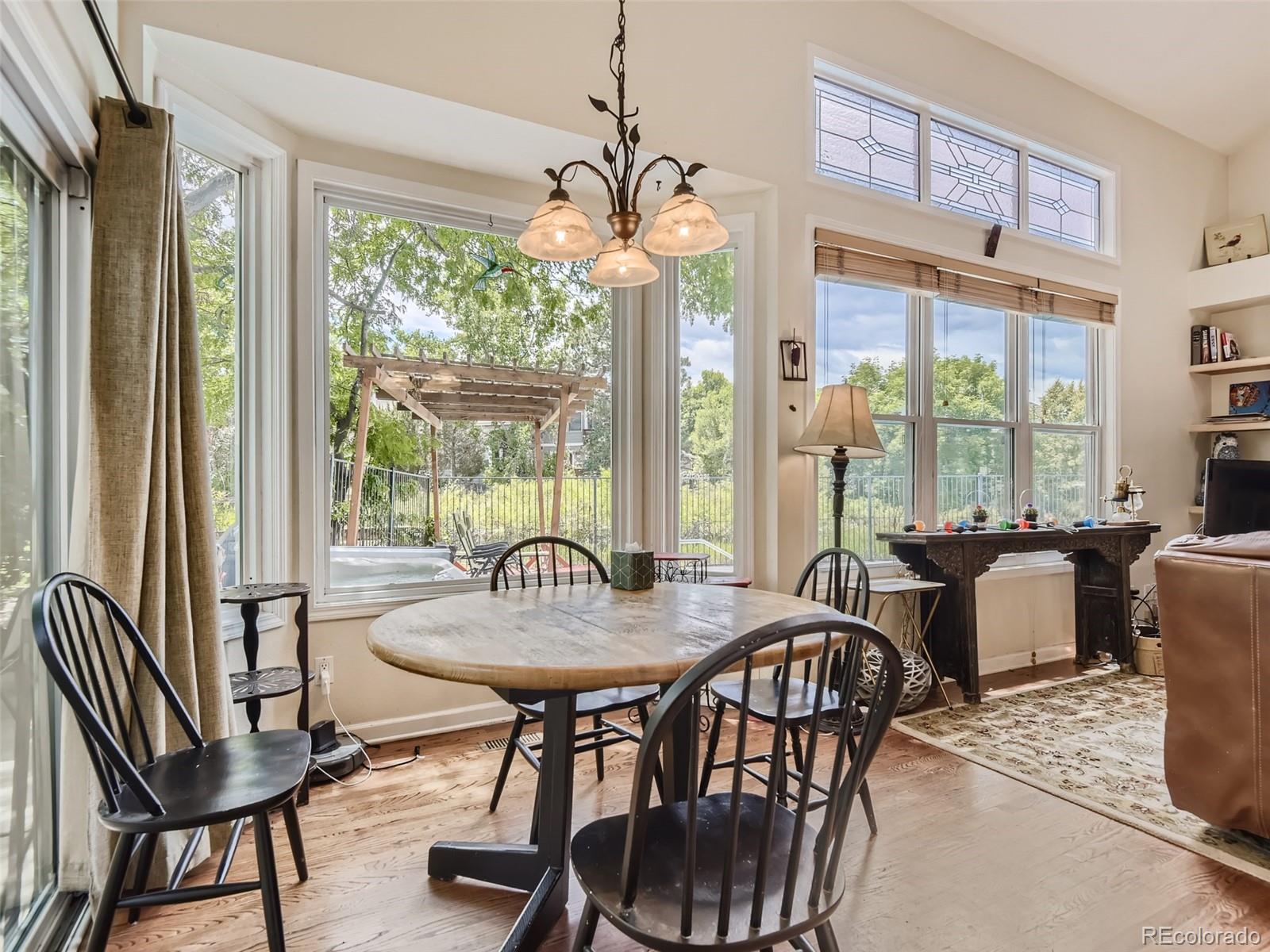 6722 Eagle Place Highlands Ranch, CO 80130 - Photo 7 of 34 a view of a dining room with furniture window and outside view