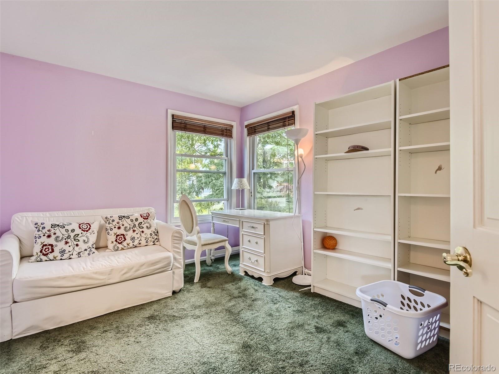 6722 Eagle Place Highlands Ranch, CO 80130 - Photo 10 of 34 a living room with furniture and a window