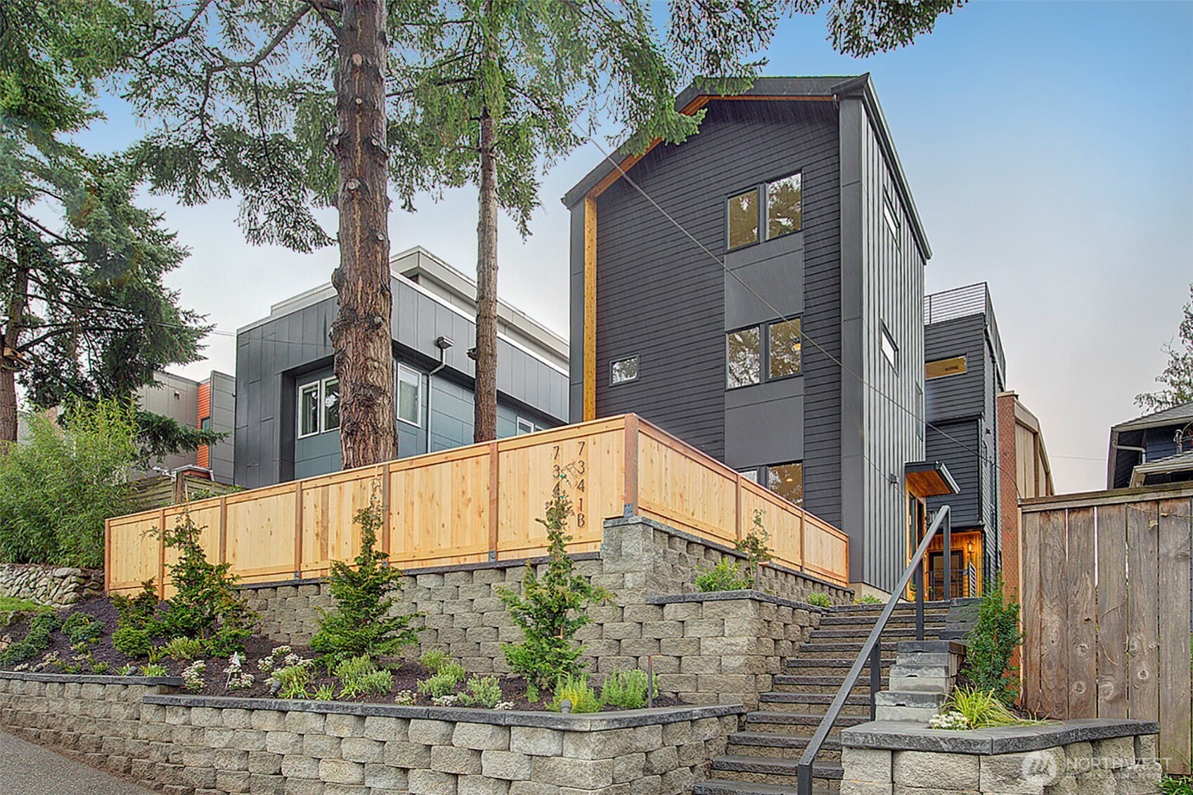 a view of a building with a tree