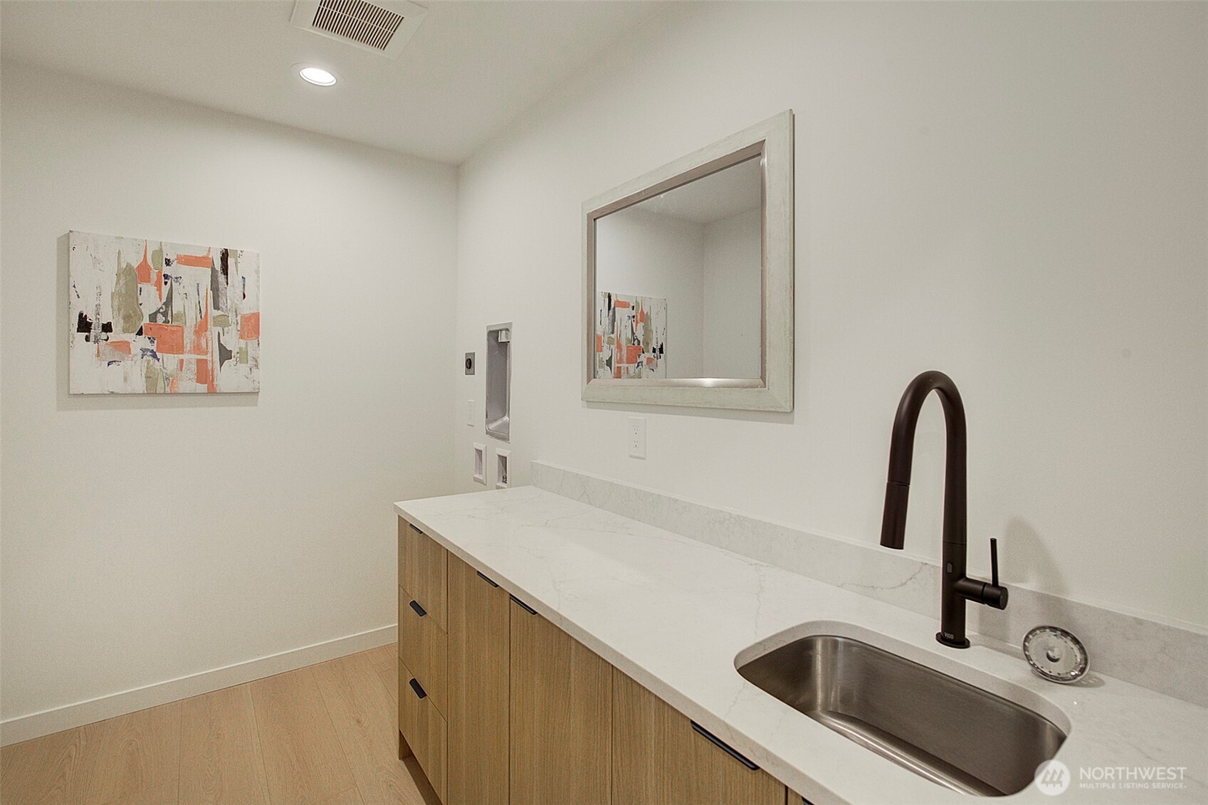 7341 California Avenue Southwest Seattle, WA 98136 - Photo 30 of 38 a close view of sink and tap