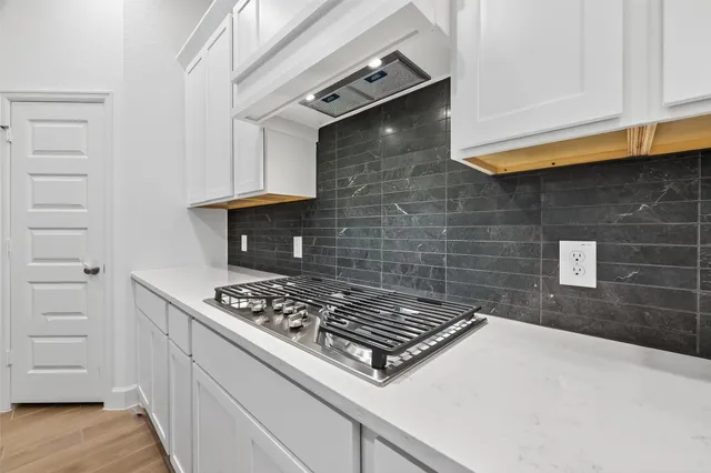a view of a storage & utility room with washer and dryer