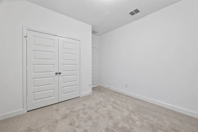 an empty room with an entryway