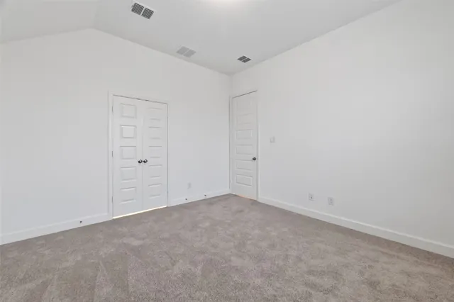 a bathroom with a sink double vanity and shower