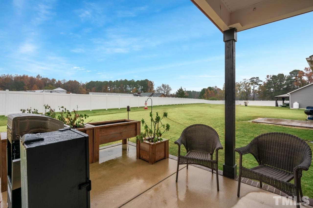 285 Bella Square Smithfield, NC 27577 - Photo 28 of 30 a terrace with outdoor seating and city view