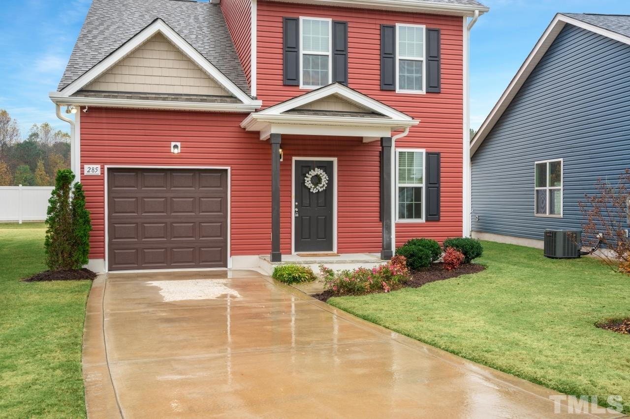 285 Bella Square Smithfield, NC 27577 - Photo 30 of 30 a front view of a house with garden
