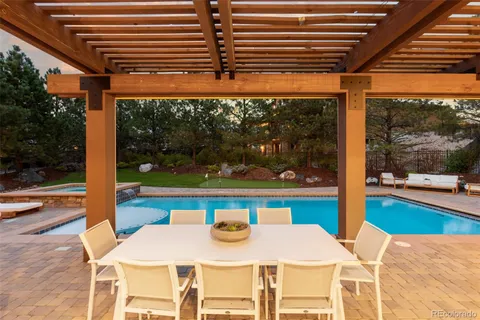 a view of an outdoor space with swimming pool
