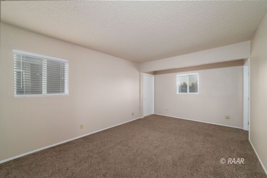 324 West Ward Avenue Ridgecrest, CA 93555 - Photo 17 of 32 an empty room with a window
