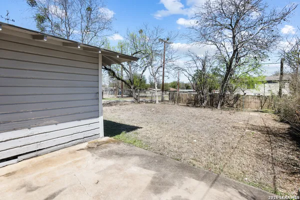 a view of a house with a snow in the yard