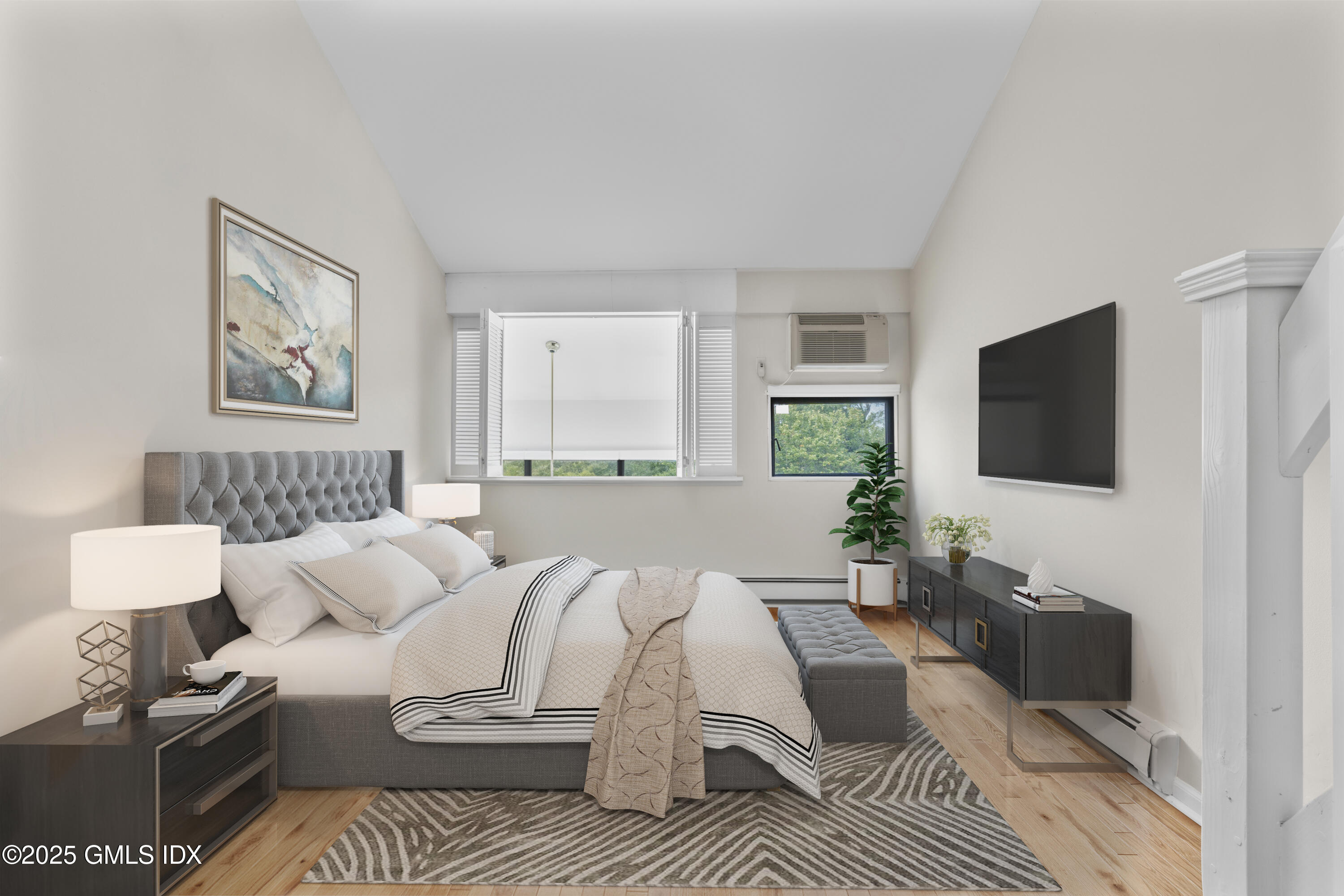 1465 East Putnam Avenue, Unit 421 Riverside, CT 06878 - Photo 16 of 29 a living room with furniture and a flat screen tv