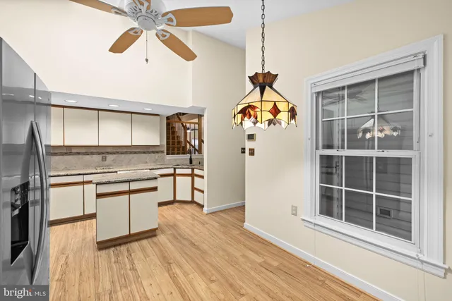 a view of a kitchen from a dining room