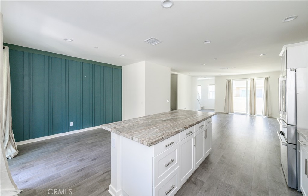 603 Shadowbrook Lake Forest, CA 92610 - Photo 22 of 60 a bathroom with a granite countertop sink and a large mirror