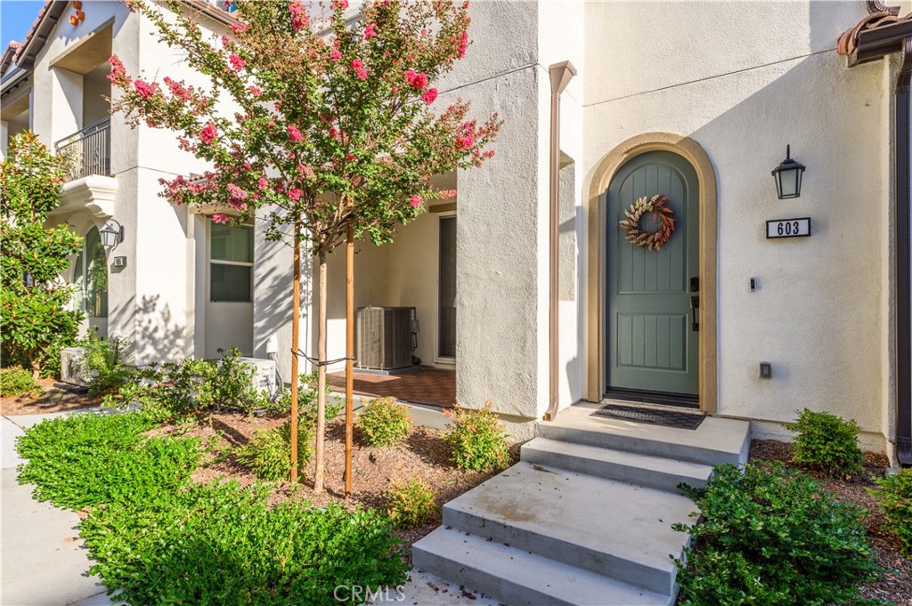 603 Shadowbrook Lake Forest, CA 92610 - Photo 3 of 60 a front view of a house with garden