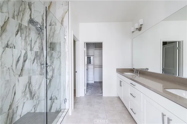 a view of a hallway with washer and dryer