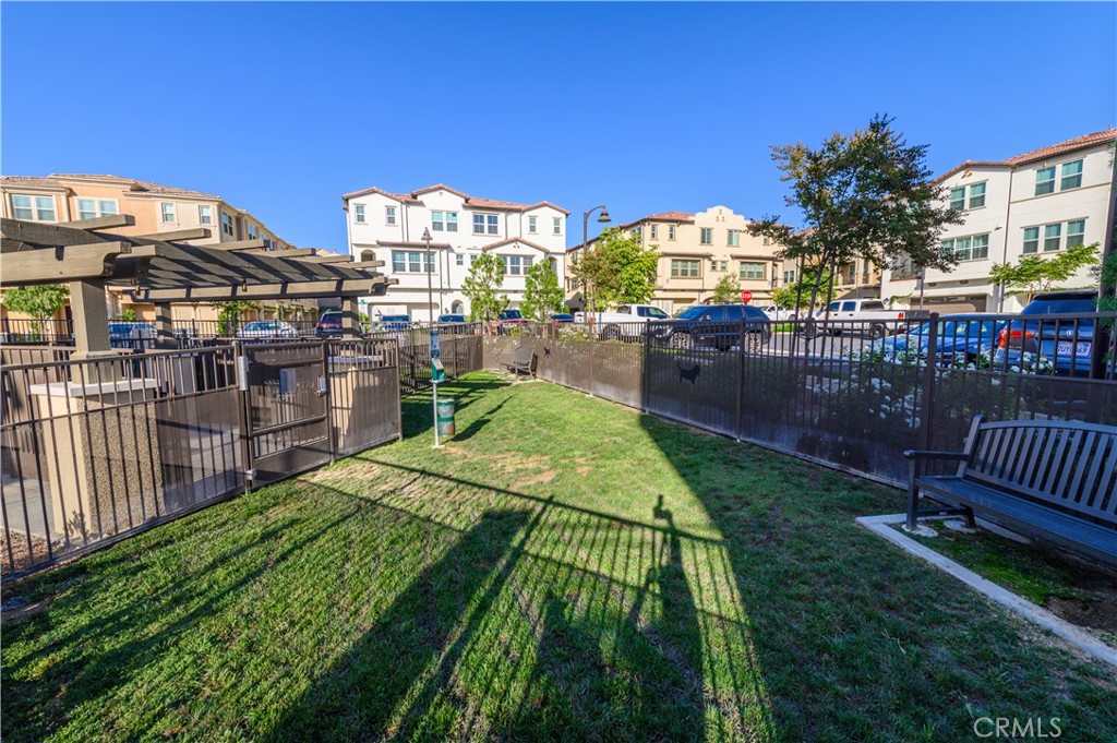 603 Shadowbrook Lake Forest, CA 92610 - Photo 42 of 60 a view of a swimming pool with a garden and plants