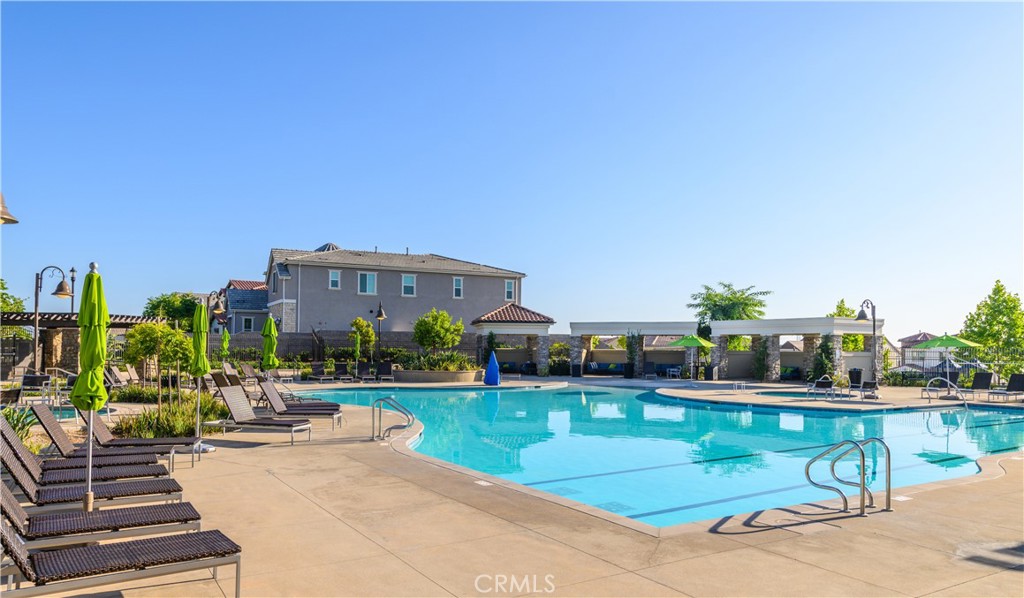 603 Shadowbrook Lake Forest, CA 92610 - Photo 47 of 60 a view of a swimming pool with outdoor seating and a terrace