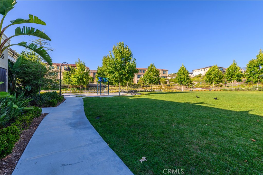 603 Shadowbrook Lake Forest, CA 92610 - Photo 52 of 60 a view of a golf course with a garden