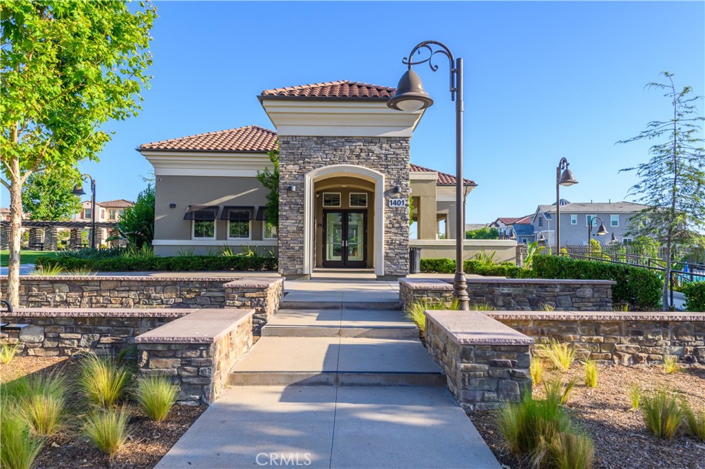 603 Shadowbrook Lake Forest, CA 92610 - Photo 60 of 60 a front view of a house with swimming pool and glass windows