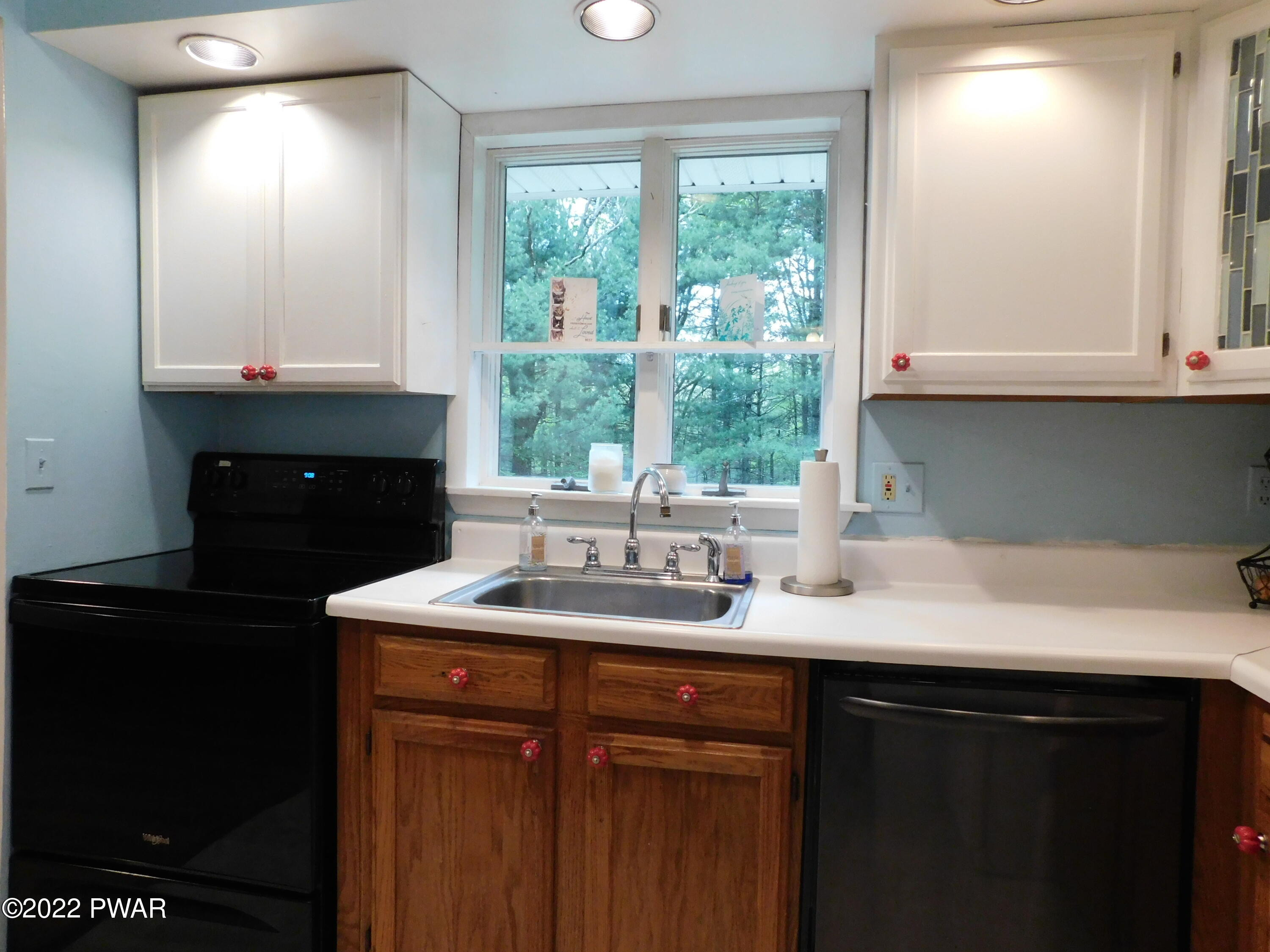 191 Fox Road Dingmans Ferry, PA 18328 - Photo 16 of 27 a kitchen with a sink and a window