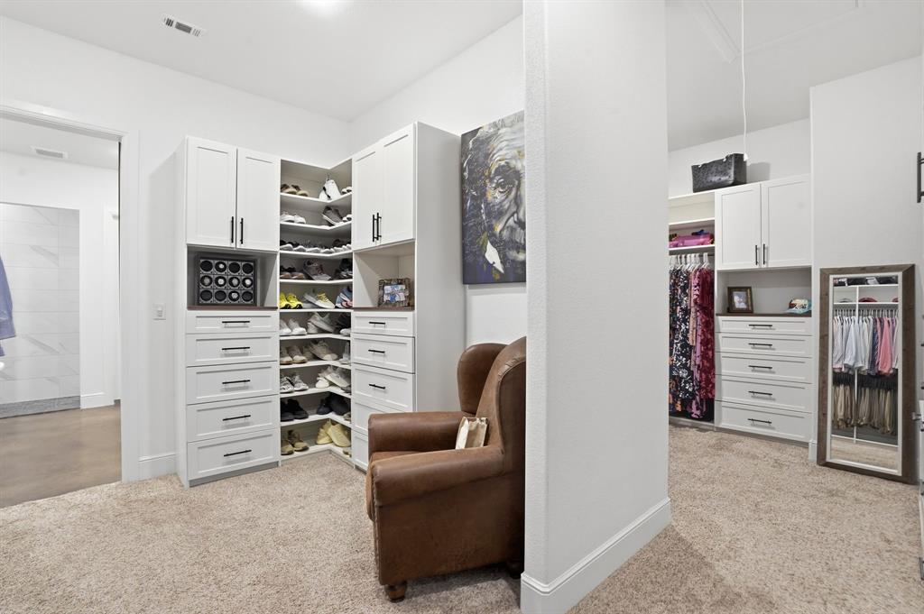 103 Apollo Trail Aurora, TX 76078 - Photo 22 of 40 Walk in closet featuring light carpet