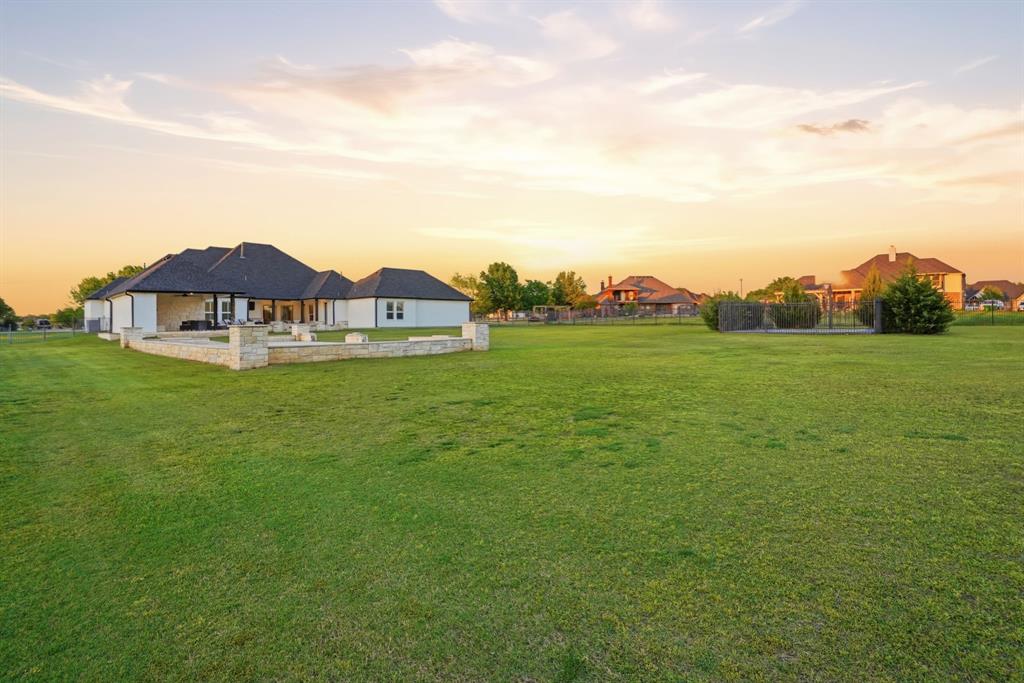103 Apollo Trail Aurora, TX 76078 - Photo 34 of 40 View of yard with a patio area