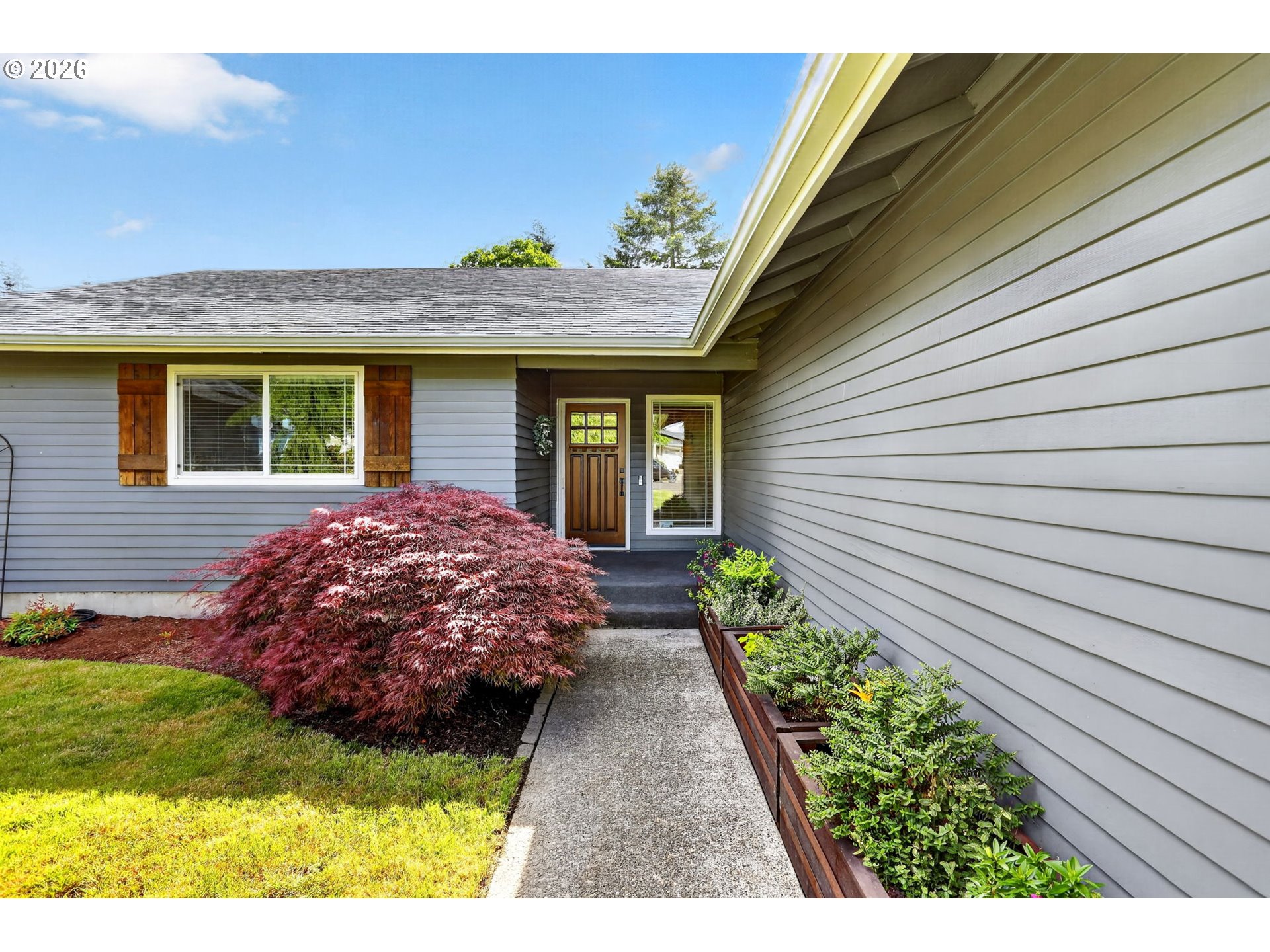 1776 Southeast 114th Place Portland, OR 97216 - Photo 7 of 47 a view of a house with a garden