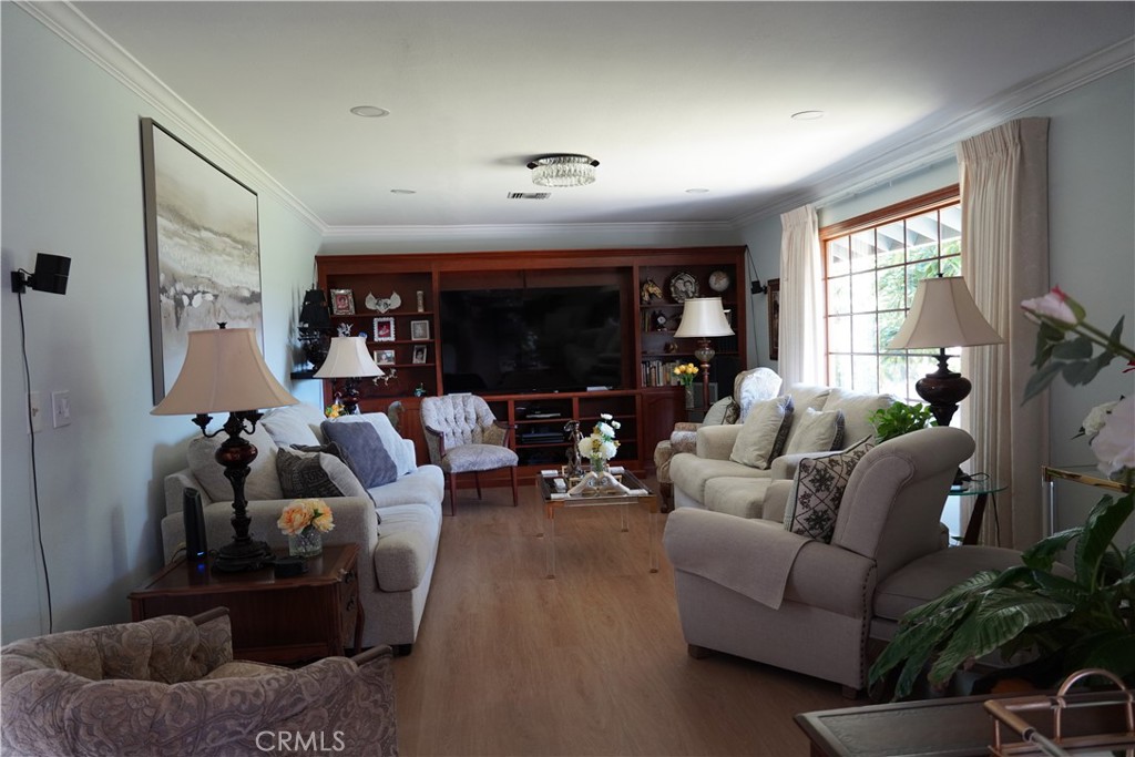 2454 Beacon Street Fullerton, CA 92835 - Photo 14 of 53 a living room with furniture and a flat screen tv