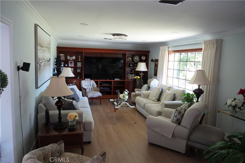 2454 Beacon Street Fullerton, CA 92835 - Photo 17 of 53 a living room with furniture and a flat screen tv