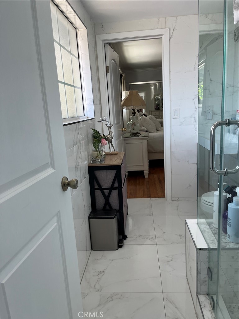 2454 Beacon Street Fullerton, CA 92835 - Photo 34 of 53 a bathroom with a sink and mirror