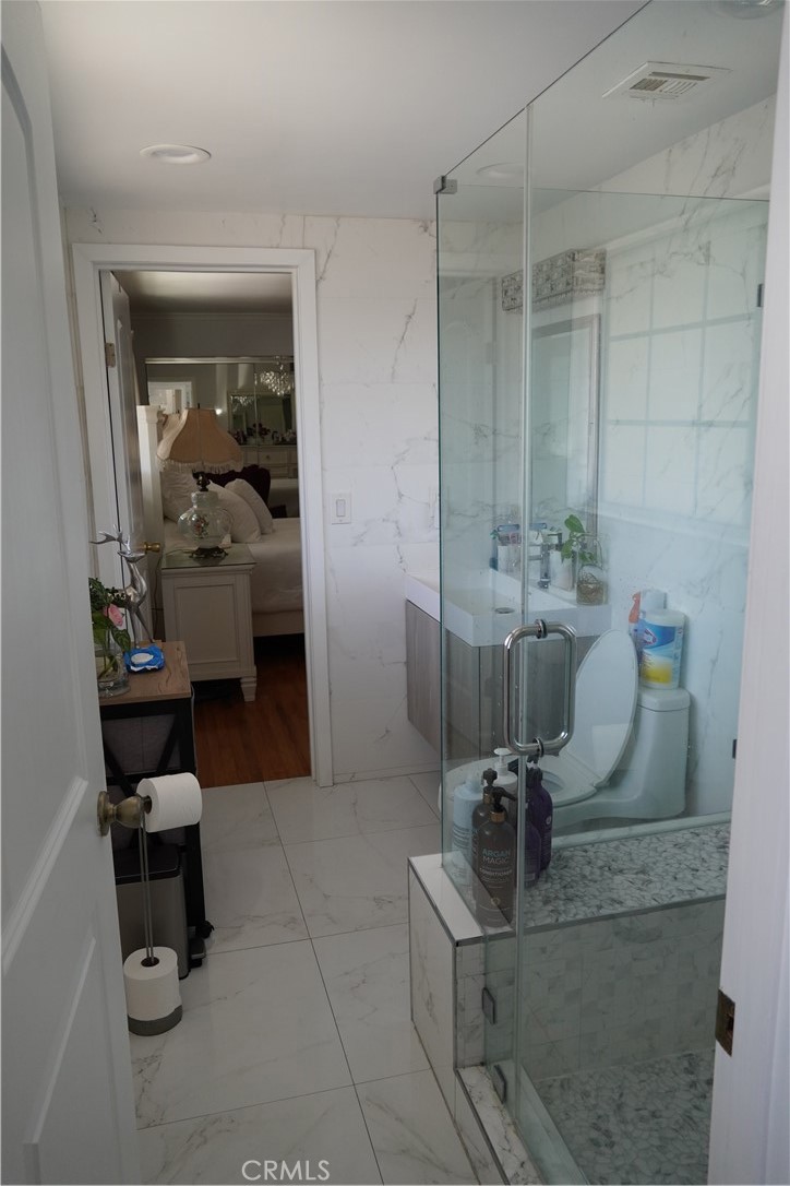 2454 Beacon Street Fullerton, CA 92835 - Photo 36 of 53 a bathroom with a sink and a mirror