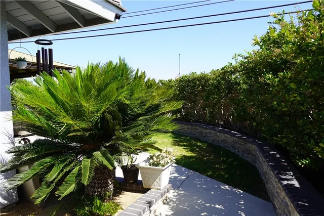 a view of a swimming pool with an outdoor space and seating area