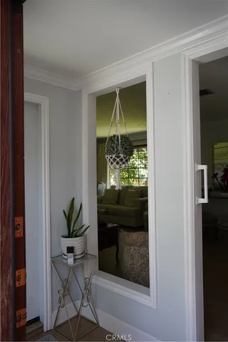 a view of an entryway with livingroom