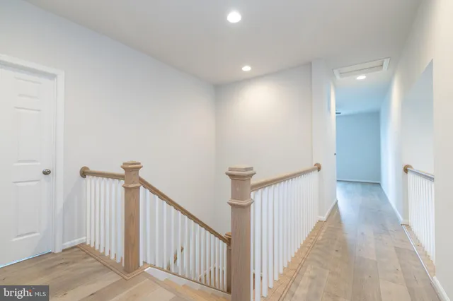 a view of a hallway with a window