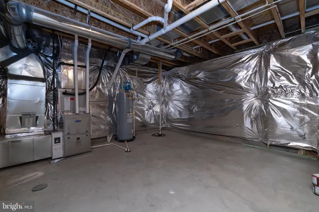 a view of an empty room with a fireplace