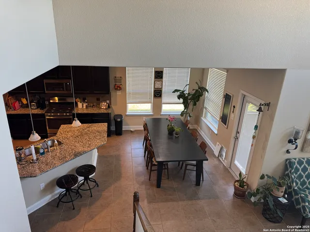 a view of a livingroom with furniture and a couch