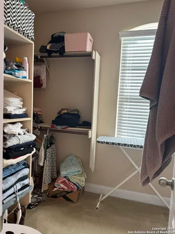 a view of room with gym equipment