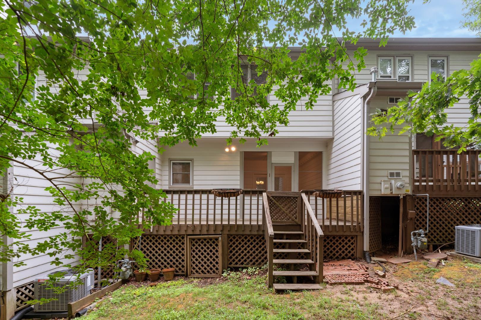 4111 Settlement Drive Durham, NC 27713 - Photo 16 of 16 a view of a deck with furniture and a yard