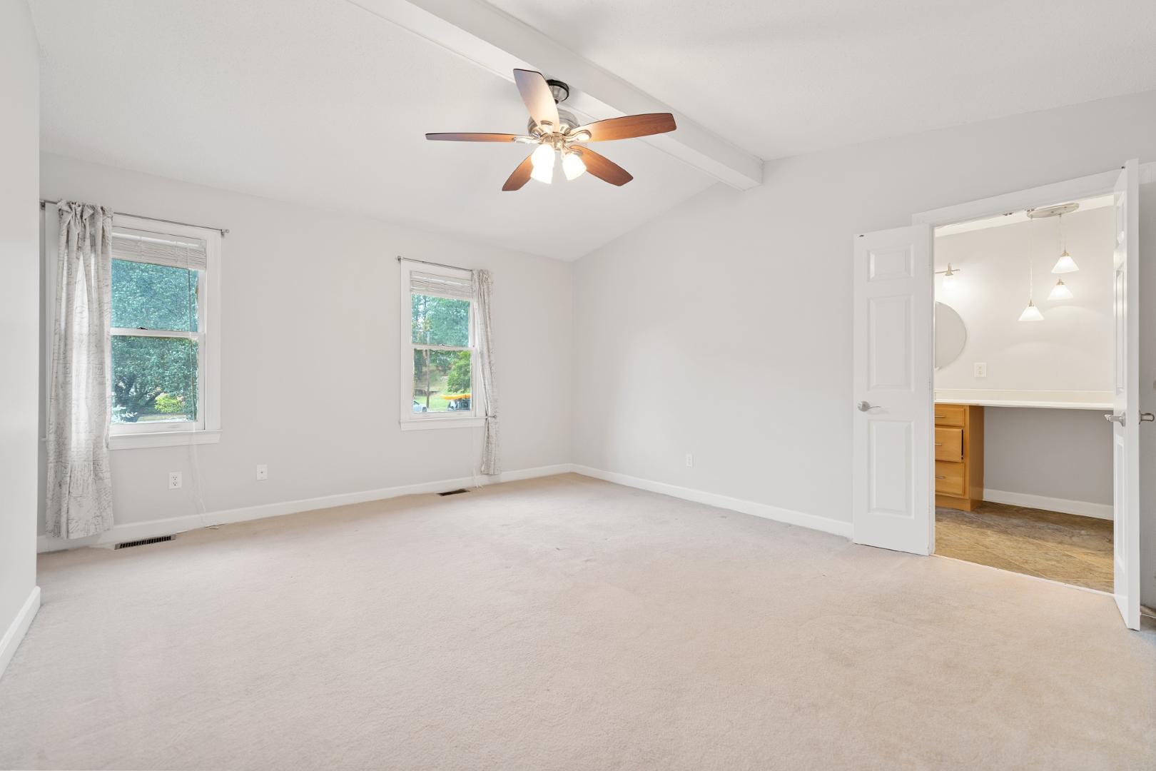 4111 Settlement Drive Durham, NC 27713 - Photo 8 of 16 a view of an empty room with a window